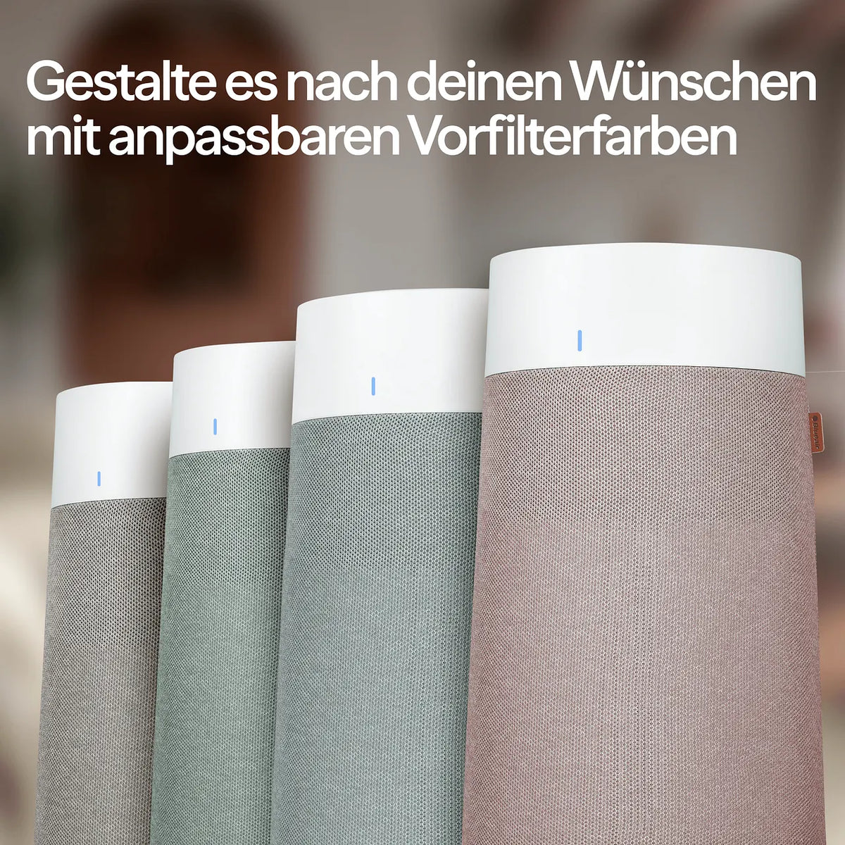 Blueair Luftreiniger mit Vorfilter-Stoffbezügen in Dunkelgrau, Grün, Hellgrau und Rosa im Vergleich